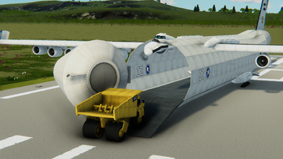 A Kolus Road Series C-4000 Dump Truck driving onto the ramp of Immanemque.